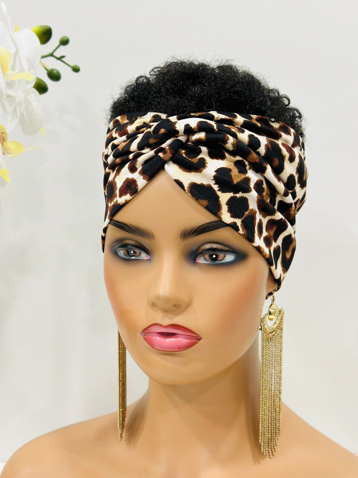 Shop the Animal Print Twist Headband, a lightweight headband with a chic twist design. Perfect for daily wear, this leopard print headband combines style and comfort!